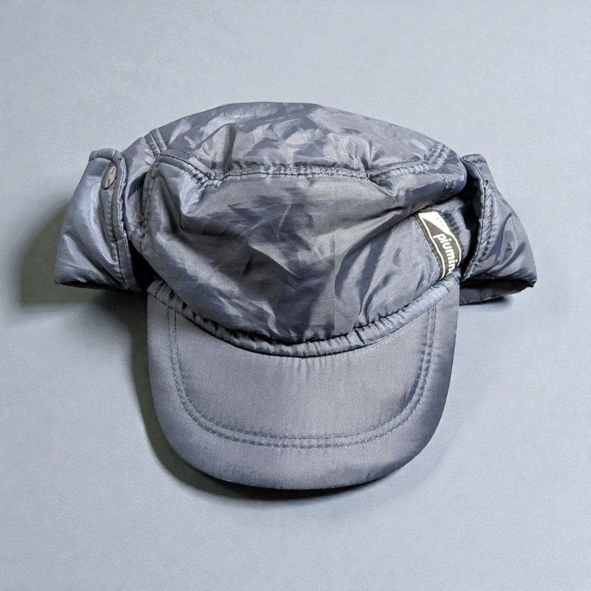 Cappello invernale imbottito piumino con paraorecchie richiudibili