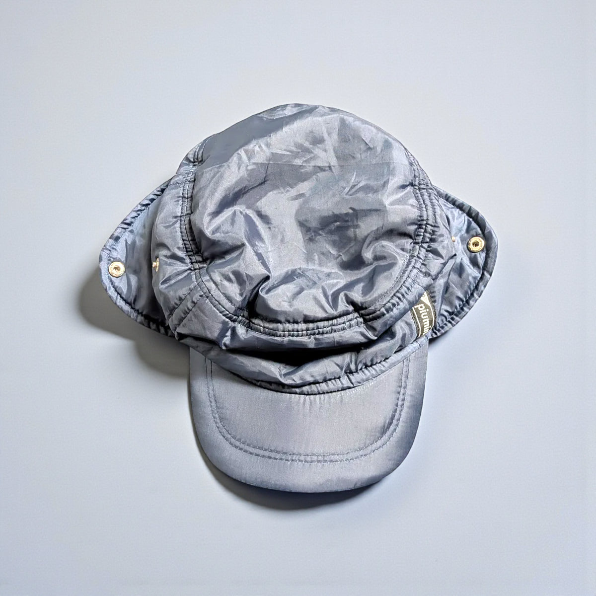 Cappello invernale imbottito piumino con paraorecchie richiudibili