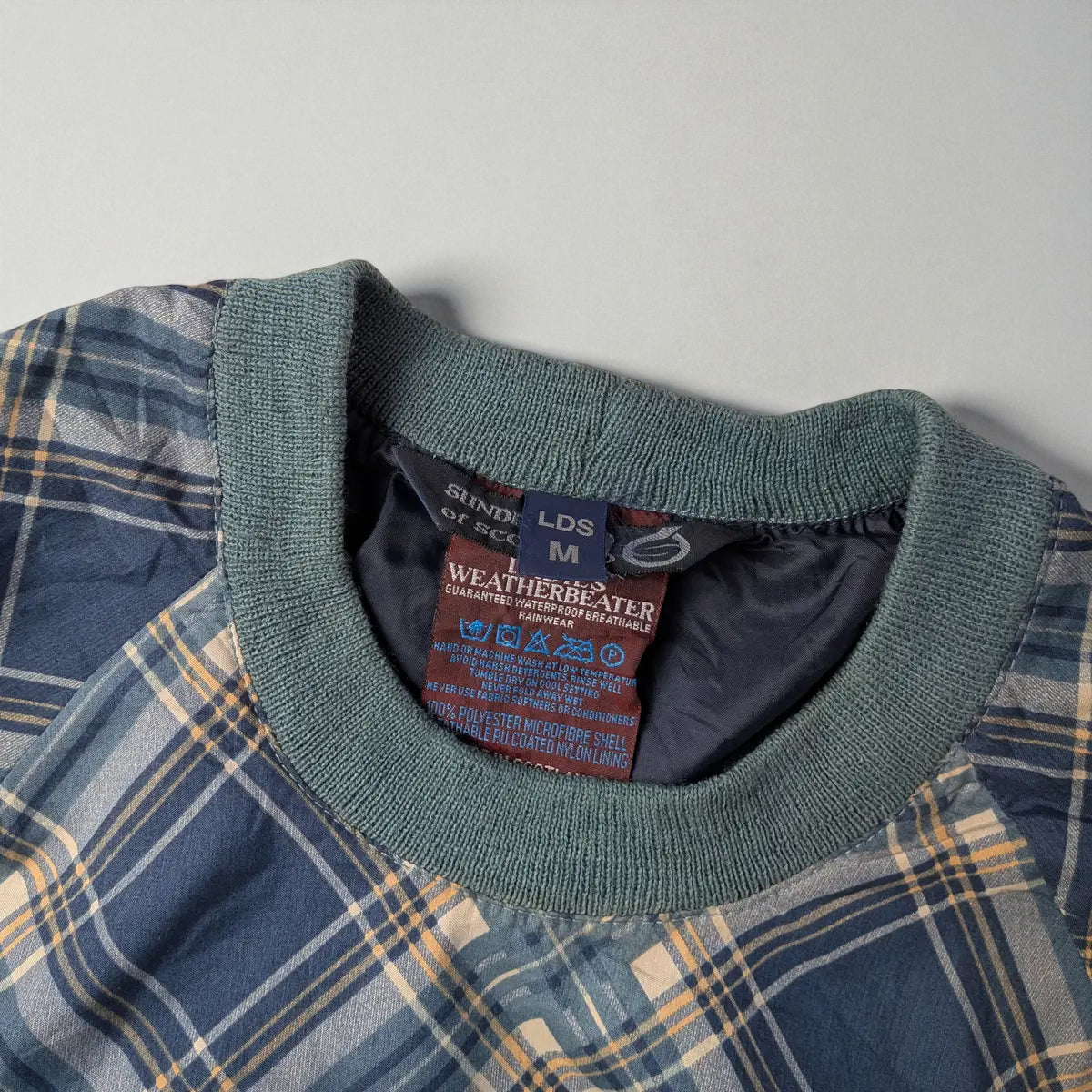 Giacca impermeabile vintage a quadri Sunderland of Scotland – M (oversize)
