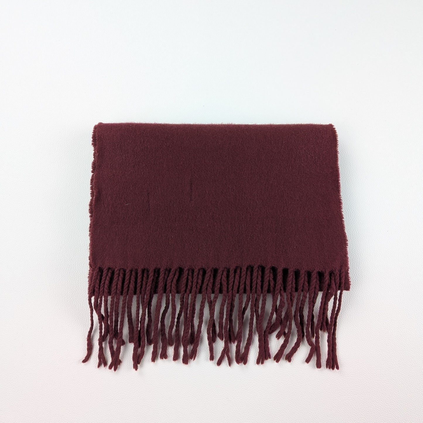Sciarpa in lana colore bordeaux intenso minimal
