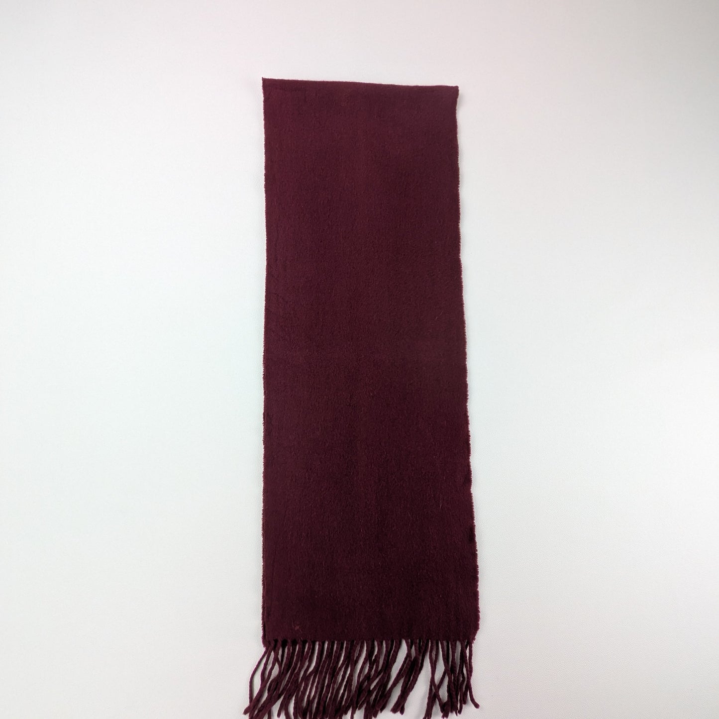 Sciarpa in lana colore bordeaux intenso minimal