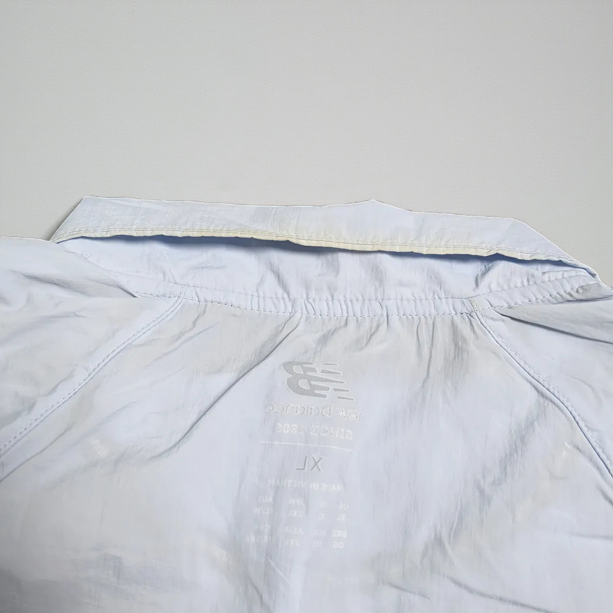 Giacca New Balance running con maxi grafica laterale - L (oversize) / XL