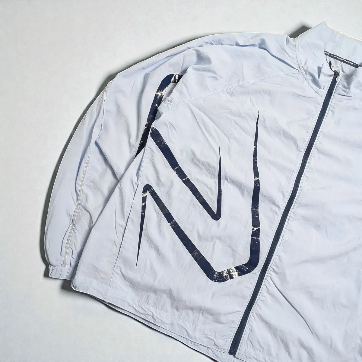 Giacca New Balance running con maxi grafica laterale - L (oversize) / XL