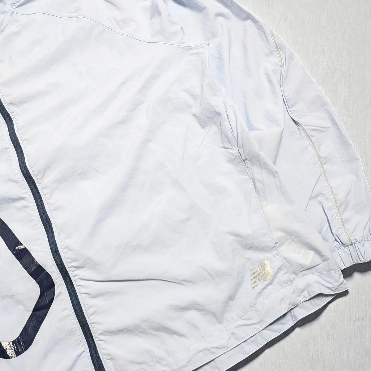Giacca New Balance running con maxi grafica laterale - L (oversize) / XL