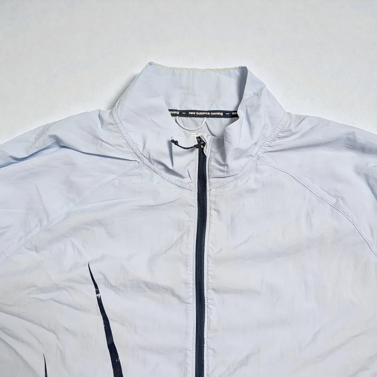 Giacca New Balance running con maxi grafica laterale - L (oversize) / XL